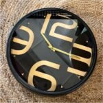 RELOJ DE PARED NEGRO Y DORADO CON VIDRIO 40 CM